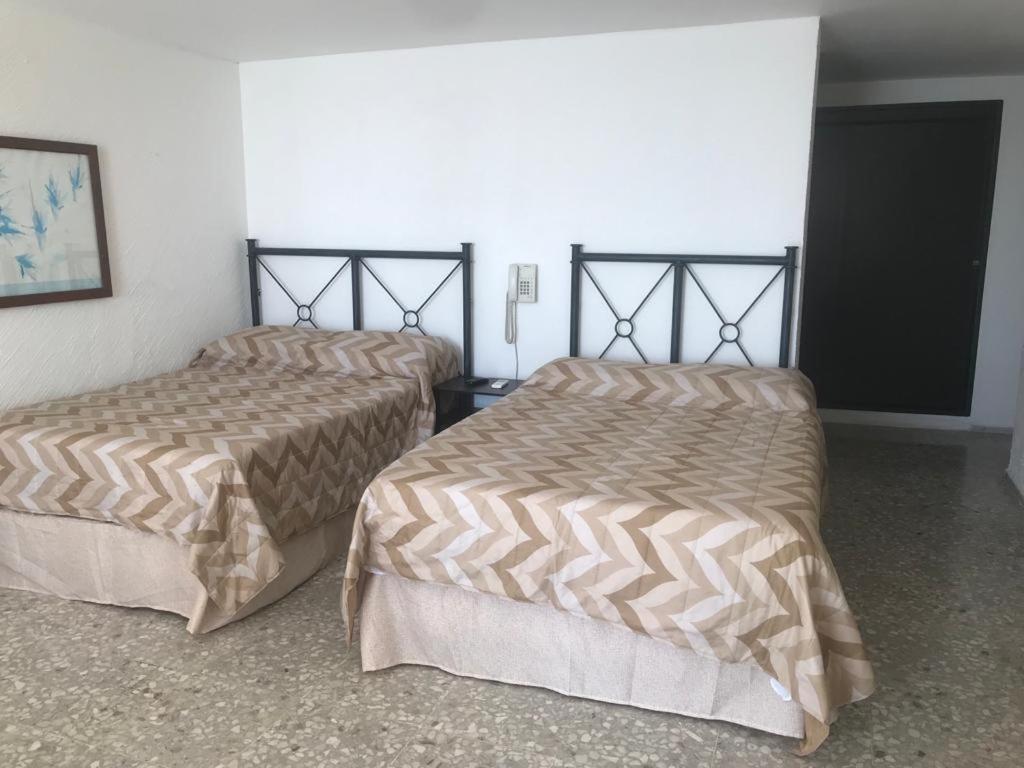 Suite frente al mar en Torres Gemelas Acapulco Exterior foto